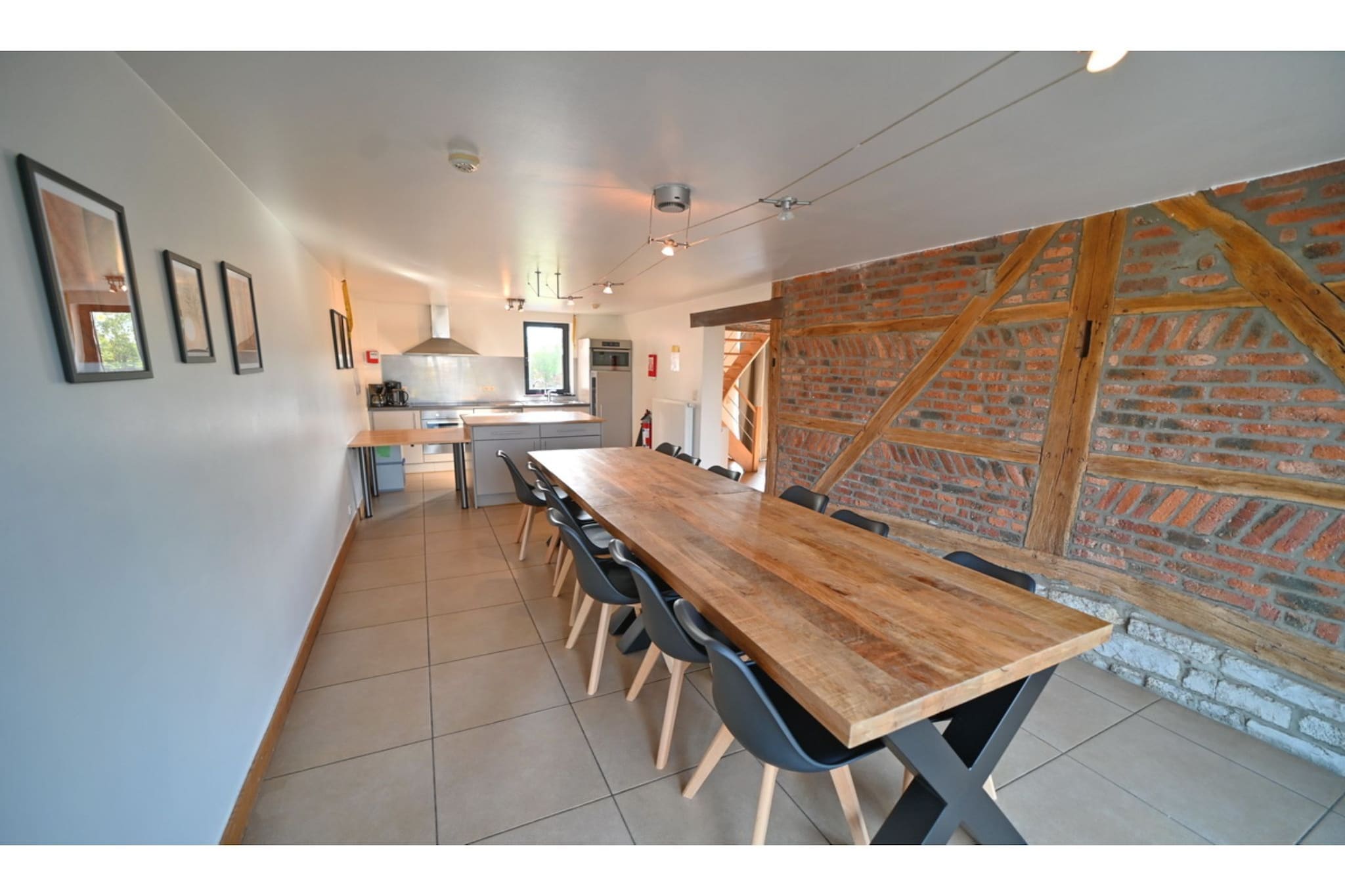 Ground floor: (Living room(double sofa bed, TV(cable), seating area, DVD player), Sitting room(seating area), dining room(dining table), open kitchen(cooker(ceramic), coffee machine, oven, microwave, dishwasher, fridge-freezer), Bedroom with bathroom(double bed, shower), toilet)\n\nOn the 1st floor: (bedroom(2x bunk bed), bedroom(double bed(twin duvet)), bedroom(2x single bed), bedroom(double bed(twin duvet)), bathroom(bath tub, toilet), bathroom(shower, toilet), mezzanine)\n\nheating(central), terrace, garden, garden furniture, BBQ, parking, children\'s bed, high chair