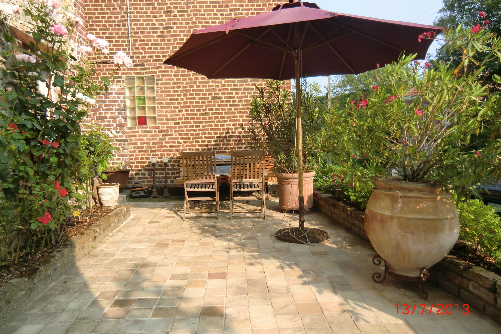 An optional utilities and service fee of EUR 60,00 will be charged before your arrival. Details are given below.<br> This 2-bedroom holiday home in Voeren has a homely ambience for a small family or group of 4 persons. It comes with a furnished terrace to enjoy lingering with a cool refreshing drink._x000D_
_x000D_
The beautiful landscape with rolling hills is great for long walks and cycling. There are beautiful cities to explore nearby such as Maastricht and Aachen. It's a wonderful location for enjoying nature and peace._x000D_
_x000D_
The home was built in 1734 and is listed as a Flemish cultural heritage building. You can enjoy a pleasant stay here with a spacious kitchen, living-dining room with fireplace, movies and music. Kids have children's bed and high chair to use. During the evenings, the fresh air and greenery will relax you on the furnished terrace. _x000D_
_x000D_
You can check-in between 4 - 6 PM and check-out between 10 - 11 AM. <br><b> Optional Utilities & Service Package </b><br><b> An optional utilities and service package of EUR 60,00 </b> can be selected prior to your arrival. You will receive a separate communication with the payment link should you wish to include it.<br>This package ensures a seamless stay and conveniently covers services such as final cleaning, utility consumption, service support, and protection against minor damages or incidental costs during your stay.<br>Guests who prefer may manage these services independently, provided the property is returned in good order at check-out.