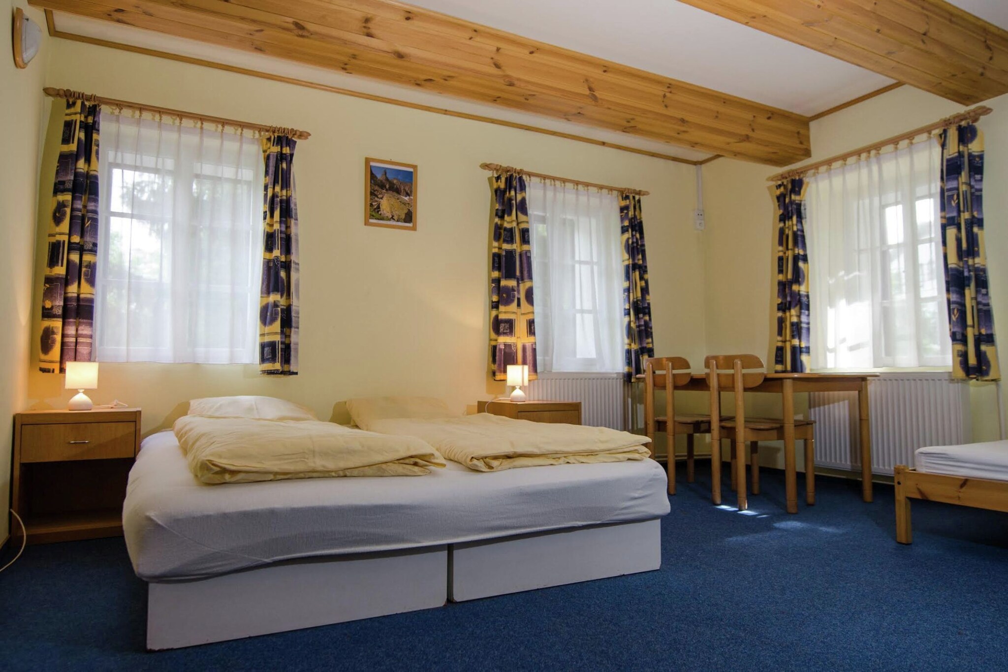 Ground floor: (Kitchen(electric kettle, 2x cooker(8 ring stoves), 2x coffee machine(filter, pads), 2x oven, microwave, dishwasher, fridge-freezer), toilet, recreation room(TV(satellite, dutch television channels), dining table(23 persons), fireplace, seating area, stereo unit, bar, fridge, party games), ski storage)\n\nOn the 1st floor: (Bedroom with bathroom(2x single bed(duvet), bunk bed, shower, washbasin, toilet), Bedroom with bathroom(2x single bed(duvet), 2x double bed(two single duvets), bunk bed(duvet), dining table(4 persons), shower, washbasin, toilet), Bedroom with bathroom(bunk bed(duvet), bunk bed, shower, washbasin, toilet), toilet)\n\nOn the 2nd floor: (Kitchenette(seating area, cooker(4 ring stoves, electric)), Bedroom with bathroom(double bed(two single duvets), shower, washbasin, toilet), Bedroom with bathroom(2x single bed(duvet), shower, washbasin, toilet), Bedroom with bathroom(2x single bed(duvet), double bed(two single duvets), shower, washbasin, toilet))\n\ngarden(private, fenced), garden furniture, parking, parasol, play equipment, children\'s bed, high chair