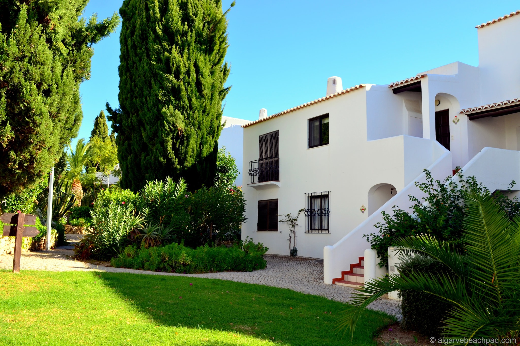 Why stay here
Located within walking distance of Sao Rafael beach, this beautiful apartment in Albufeira is where any person on a coastal holiday would want to be in. Perfect for small families, the apartment has a shared swimming pool with a separate section for children to enjoy.
Things to do around
Within 5 minutes, you reach the Sao Rafael beach, where you can swim, play, and sunbathe. Various other beaches of Algarve including Praia da Marinha and Praia do Túnel with promenades and nightlife fun also invite you. The old town of Albufeira and the Castle of Silves are worth exploring. Golfing, surfing, hiking, and cycling are popular activities in the region.
What to expect from the space
There are 2 patios to have splendid meals outdoors. A shared garden is at your disposal. Cot and high chair can be rented for a small fee. In the pantry, you have a washing machine.
More for your stay
The airport is at 35 km.
Check-in timings are 2-10 PM and check-out timings are 9-11 AM.
Note: There is no mid-week clean/linen change.  This is done after 7 days, or if a 10 day stay on day 5.  The kitchen towels are done at the same time.