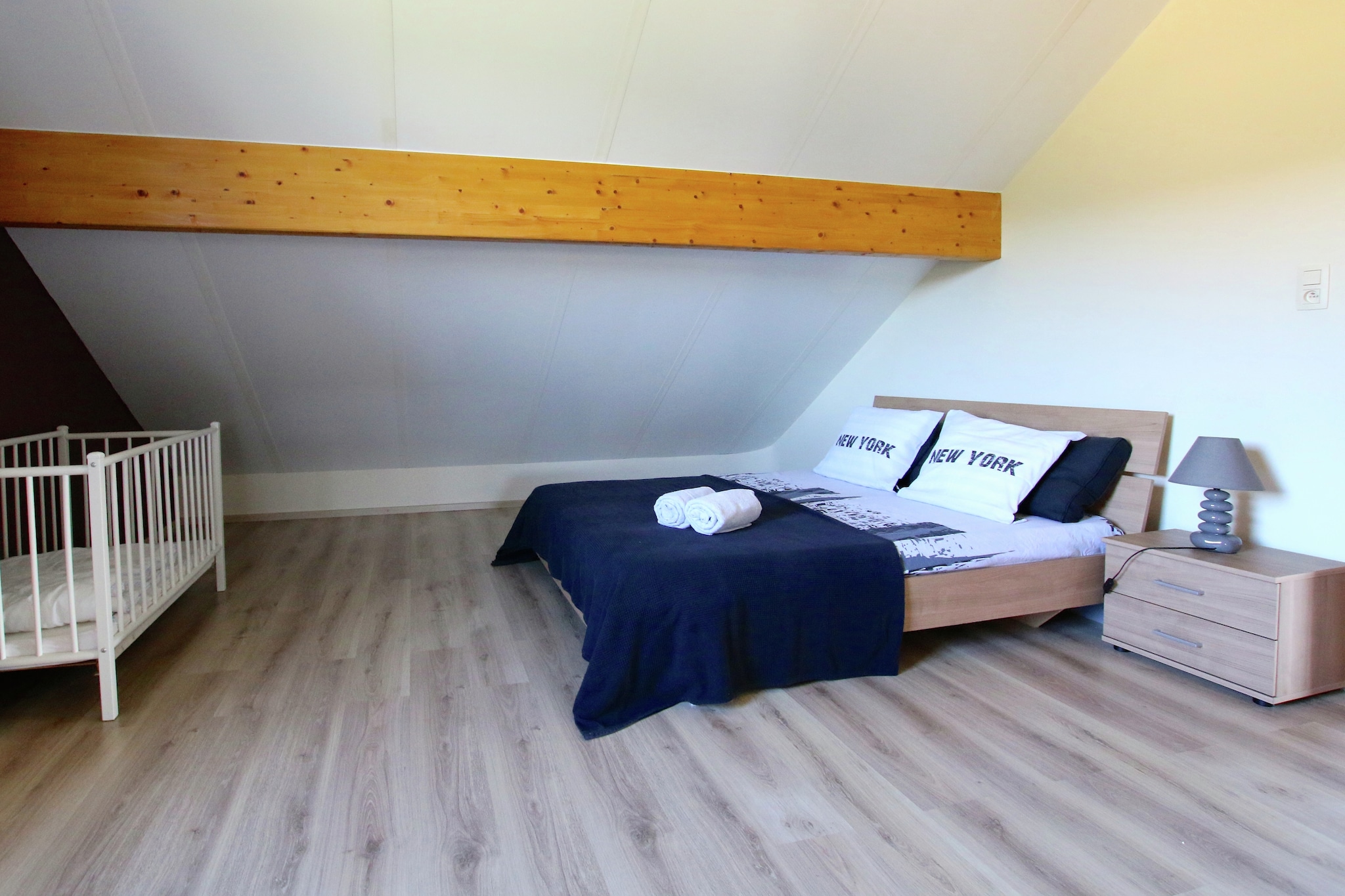 Ground floor: (hallway, open kitchen(electric kettle, toaster, coffee machine(filter, pads), oven, microwave, dishwasher, fridge-freezer, Blender), Living/diningroom(TV(digital), fireplace, DVD player, stereo unit), bedroom(double bed(twin duvet, 160 x 200 cm)), bathroom(shower(walk-in shower), washbasin, washing machine), toilet, garage, balcony)\n\nOn the 1st floor: (TV room(TV), bedroom(single bed(duvet), double bed(160 x 200 cm)), bedroom(single bed(duvet, 90 x 200 cm), double bed(160 x 200 cm)), bedroom(double bed(twin duvet, 160 x 200 cm), children\'s bed), walk-through bedroom(2x single bed(duvet, 90 x 200 cm)), bathroom(bath tub, shower(walk-in shower), 2x washbasin, toilet))\n\nBasement: (table tennis table, table football, billiards)\n\nBubble bath, fridge, freezer, garden(private), garden furniture, BBQ, changing mat, ironing board, iron