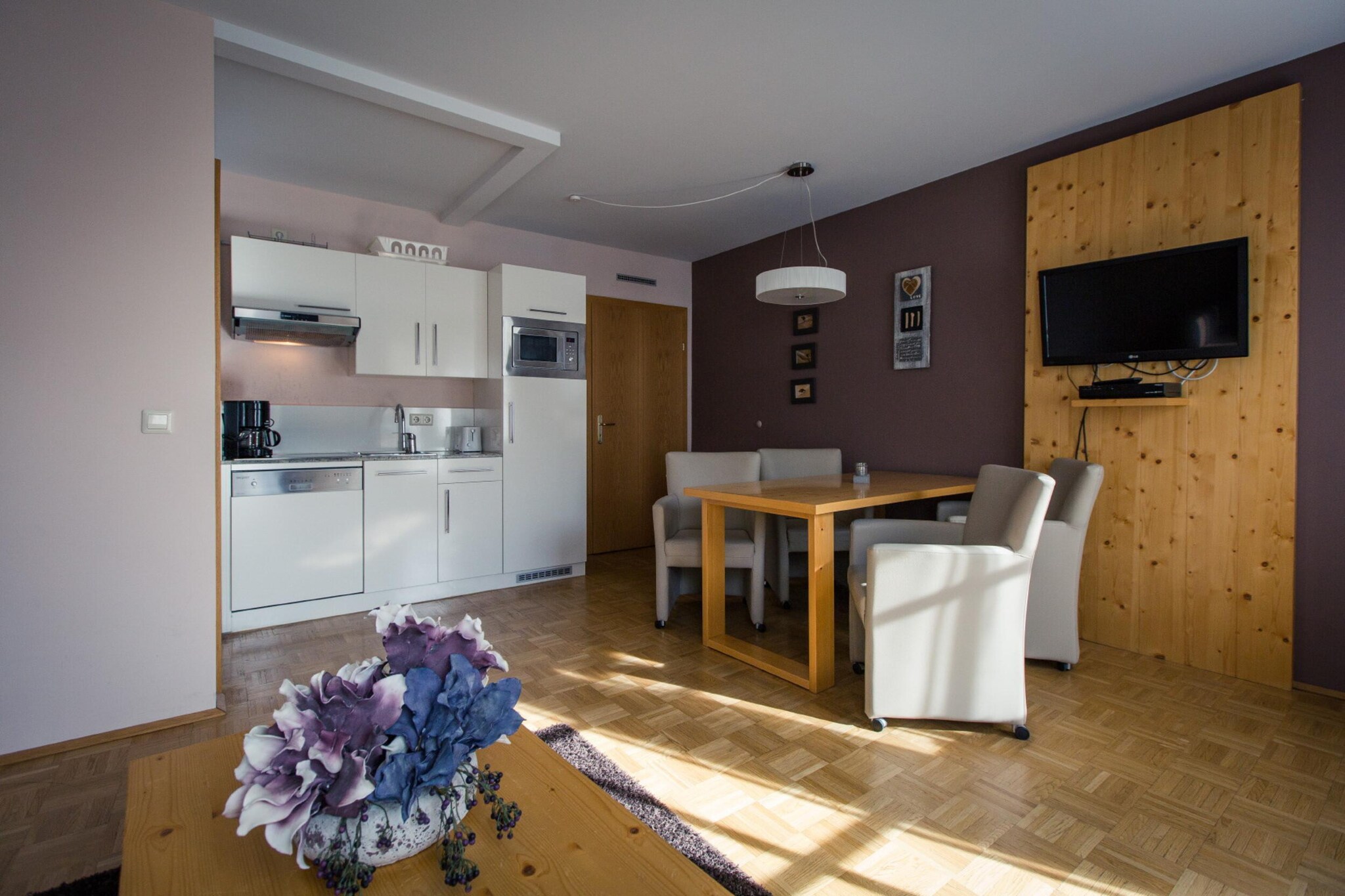 On the 1st floor: (hallway, Living room(TV(satellite)), Kitchen(electric kettle, toaster, cooker(4 ring stoves, ceramic), coffee machine(filter), dishwasher, fridge-freezer), bedroom(double bed), walk-through room(bunk bed), bathroom(shower, washbasin, toilet, hairdryer), storage, Internet access, balcony, heating(central))\n\ngarden furniture, parking