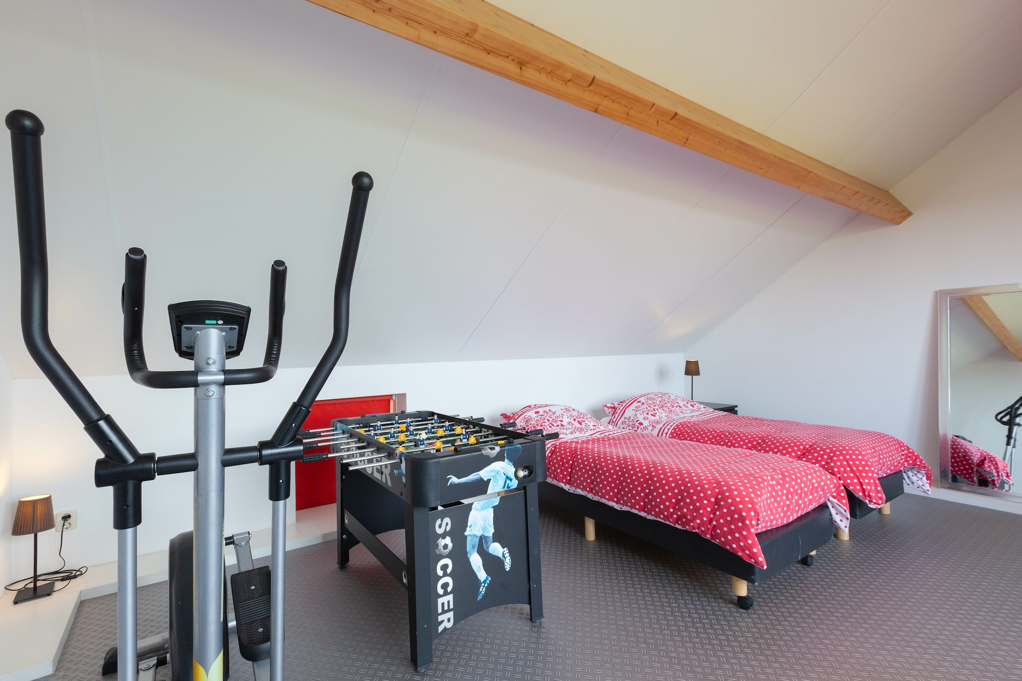 Ground floor: (open kitchen(toaster, coffee machine, combination microwave, dishwasher, fridge-freezer), Living/diningroom(double sofa bed, TV, dining table, DVD player, radio, CD player, stereo unit, gas fireplace), Bedroom with bathroom(2x single bed, shower, washbasin), pantry(tumble dryer, washing machine), toilet)\n\nOn the 1st floor: (bedroom(double bed or 2 single beds), bedroom(double bed or 2 single beds), bathroom(bath tub, shower, washbasin, toilet), Landing(sauna), infrared sauna)\n\nOn the 2nd floor: (bedroom(double sofa bed, double bed or 2 single beds), playroom(table football, fitness equipment), roof terrace)\n\nheating(floor heating), terrace(private), garden, garden furniture, parking