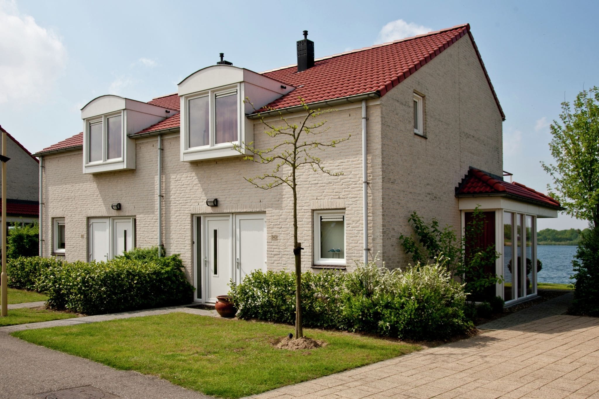 Haus mit Garten in einem Ferienpark in Limburg