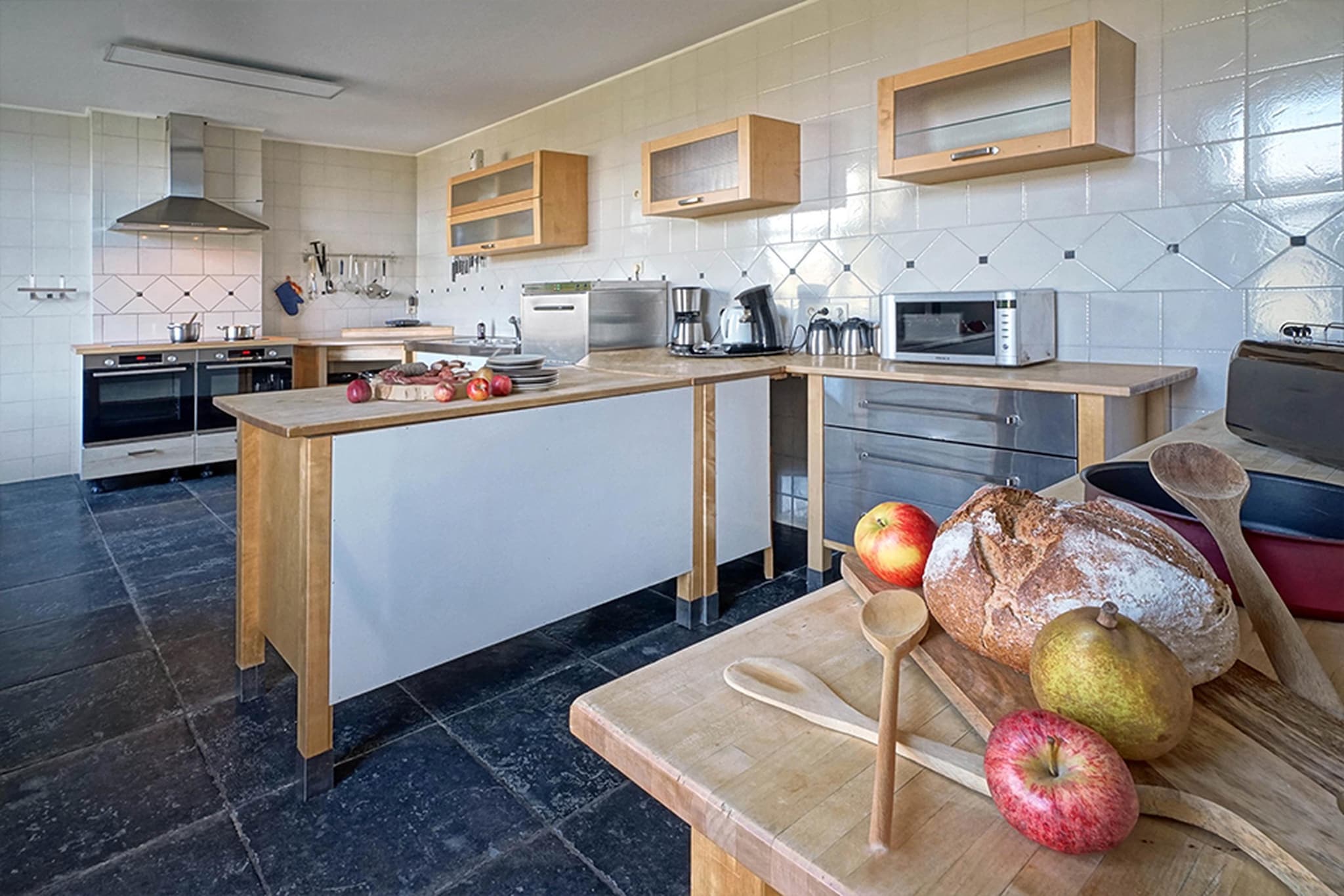 Ground floor: (hallway, Kitchen(oven, microwave, dishwasher, freezer, fridge-freezer), Living/diningroom(TV, fireplace, DVD player, stereo unit), toilet, toilet, playroom(bar, billiards), storage(tumble dryer, washing machine))\n\nOn the 1st floor: (bedroom(2x single bed(90 x 200 cm), bunk bed, TV), Bedroom with bathroom(double bed(140 x 200 cm), bath tub, washbasin, toilet), Bedroom with bathroom(single bed(90 x 200 cm), double bed(140 x 200 cm), TV, bath tub, washbasin, toilet), Bedroom with bathroom(bunk bed, TV, shower, washbasin, toilet), Bedroom with bathroom(double bed(140 x 200 cm), TV, shower, washbasin, toilet), Bedroom with bathroom(double bed(140 x 200 cm), TV, shower, washbasin, toilet), Bedroom with bathroom(double bed, TV, shower, washbasin, toilet), Bedroom with bathroom(single bed(90 x 200 cm), double bed(140 x 200 cm), bath tub, washbasin, toilet), bathroom(bath tub, shower, washbasin, toilet))\n\nPool house: (Turkish steambath, sauna, swimming pool(private, heated, roofed,  9 x  4 m.))\n\nterrace, garden(private, fenced), garden furniture, BBQ, parking, play equipment, children\'s bed(on request), children\'s bed, high chair, high chair