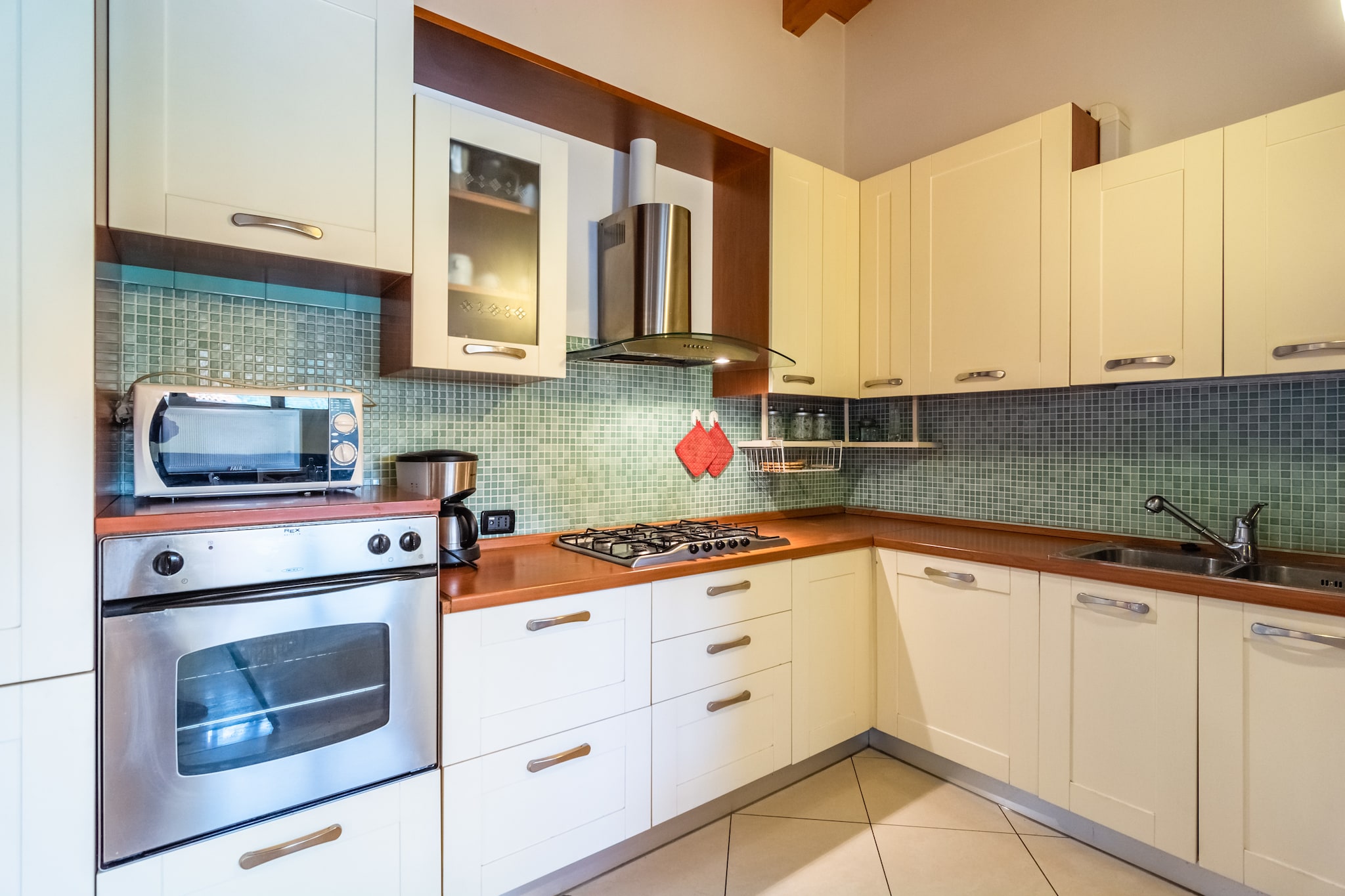 On the 1st floor: (Living room(TV(satellite)), Large kitchen(coffee machine, microwave, dishwasher, fridge-freezer), bedroom(double bed), bedroom(double bed), bedroom(double bed or 2 single beds), bedroom(double bed or 2 single beds), bathroom(shower, washbasin, toilet, bidet), bathroom(shower, washbasin, toilet, bidet), terrace(private), garden furniture)\n\nair conditioning, garden, parking, swimming pool(shared with other guests, 14 x  7 m., opened from Jun upto and including Sep)