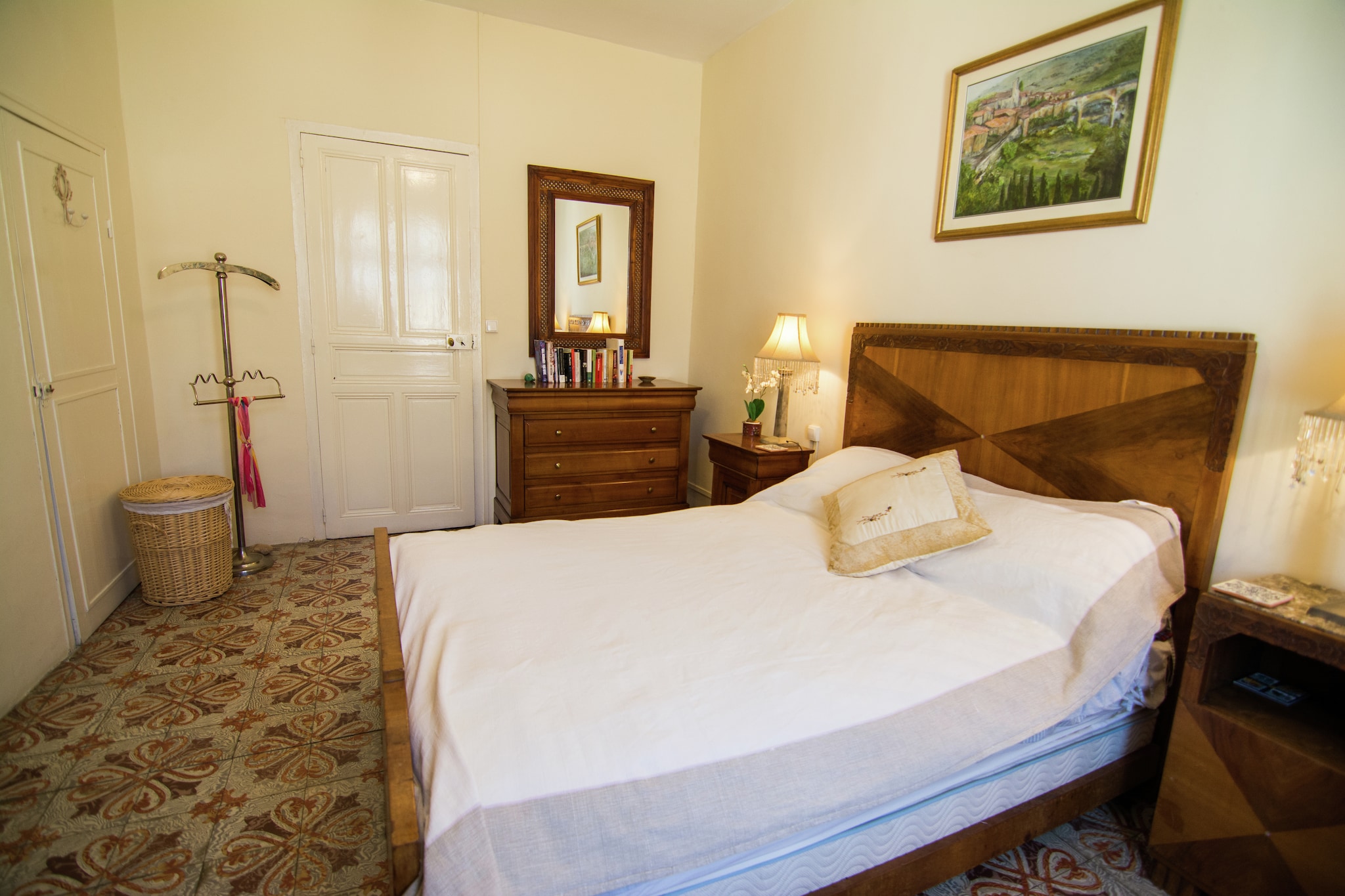 Discover the charm of this former winegrower's house in the heart of historic Thézan-lès-Béziers. With a private terrace and garden featuring a tranquil fountain, it's the perfect spot to ease into your holiday mornings. Surrounded by organic vineyards and quaint villages, the home offers a peaceful retreat with easy access to nature and local culture. Just 20 km from the sea and steps from a swimmable river, the location invites outdoor adventures-from mountain hikes to riverside picnics. After a day of exploring, enjoy dinner at one of the cozy nearby restaurants. The village atmosphere adds warmth and authenticity to your stay. Inside, the house features comfortable bedrooms, a stylish living room with elegant furnishings, and a well-equipped kitchen for home-cooked meals. A washing machine makes longer stays easy, and while garage parking isn't available, a public car park is conveniently located just 200 meters away. This villa blends rustic charm with modern comfort for a memorable escape.