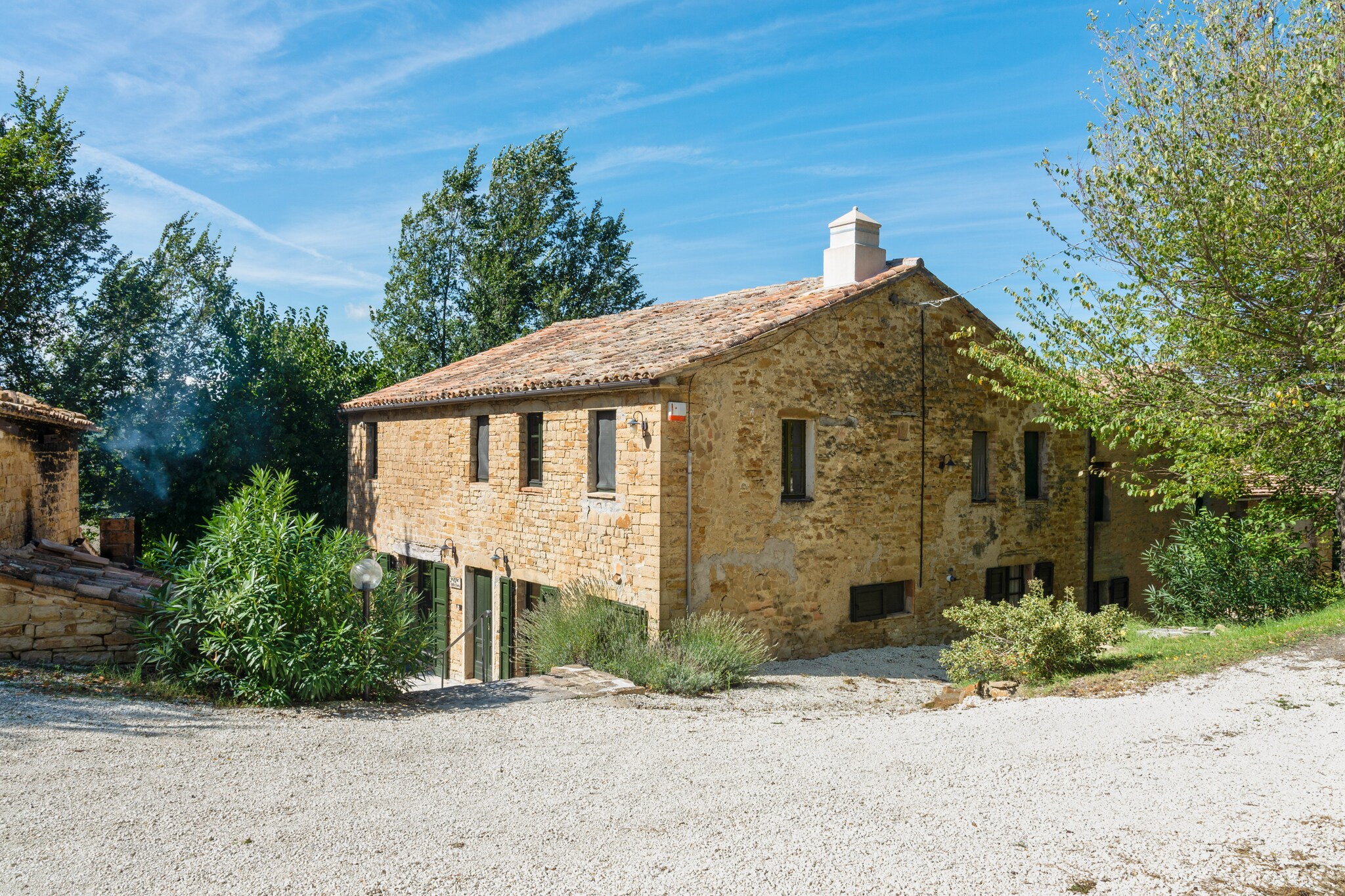 An optional utilities and service fee of EUR 200,00 will be charged before your arrival. Details are given below.<br> Located in Serra San Quirico, this mansion with 7 bedrooms can house 18 people. Ideal for many families, this mansion features a bubble bath, so that you can warm up and a swimming pool (private) where you can take a dip. You can enjoy walking in the forest 100 m away. The stores are 5 km away. Just 40 km away is the sea where you can go for day trips. Grotte di Frasassi Caves, a fascinating uderground cave complex awaits you a drive away. The centrally heated mansion has a terrace along with barbecue facility, making it well-suited for families or friends. There is a table tennis table to keep you active indoors. Parking is on-site. Cot and high chair is available on request in this property. Ancona Airport is 35 km away from the mansion. <br><b> Optional Utilities & Service Package </b><br><b> An optional utilities and service package of EUR 200,00 </b> can be selected prior to your arrival. You will receive a separate communication with the payment link should you wish to include it.<br>This package ensures a seamless stay and conveniently covers services such as final cleaning, utility consumption, service support, and protection against minor damages or incidental costs during your stay.<br>Guests who prefer may manage these services independently, provided the property is returned in good order at check-out.