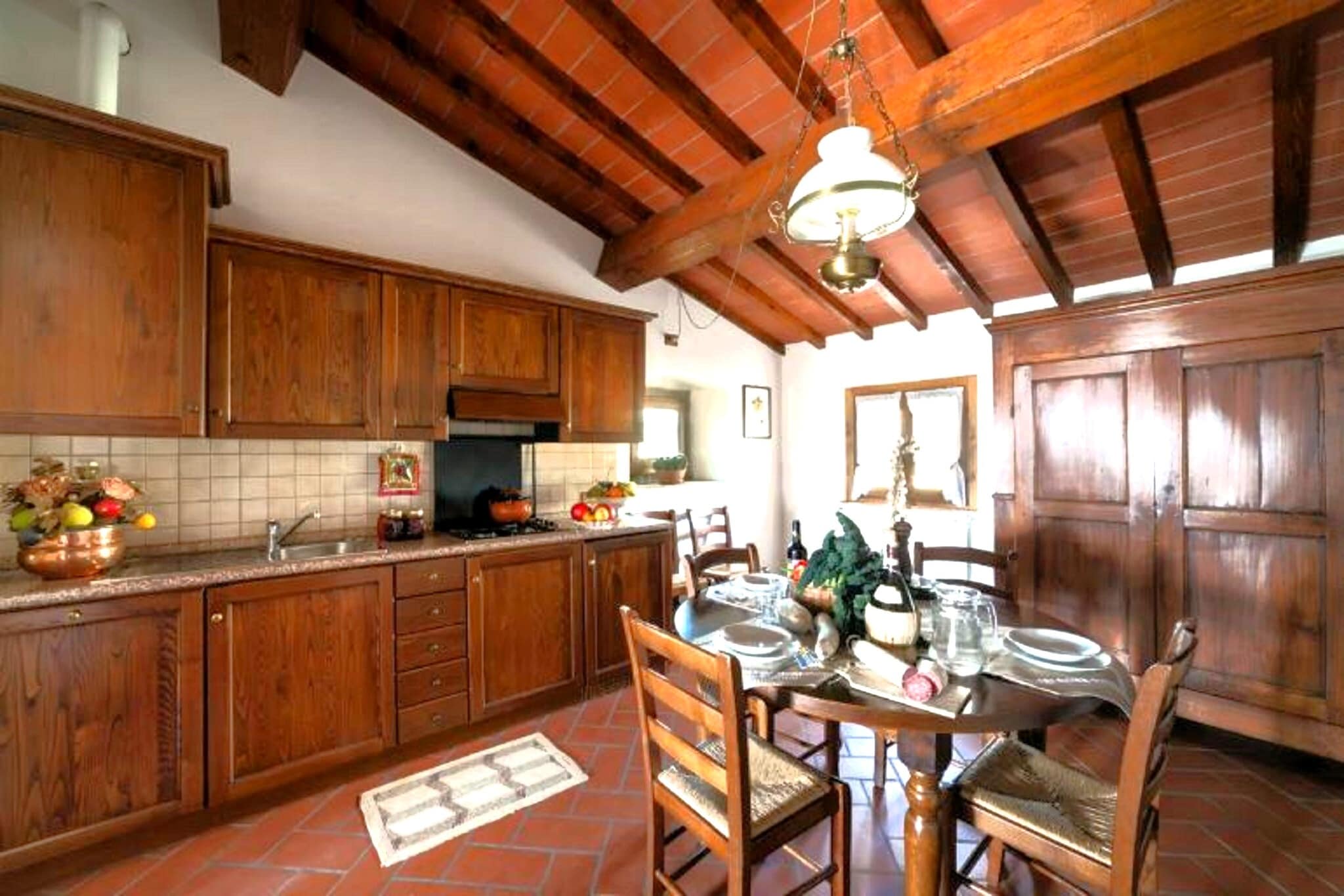 On the 2nd floor: (Large kitchen(dishwasher, fridge-freezer), Living/bed room(double sofa bed, TV), bedroom(double bed or 2 single beds), bedroom(double bed or 2 single beds), bathroom(shower, washbasin, toilet, bidet), Landing, terrace(shared with other guests, roofed))\n\nrecreation room(shared with other guests, reachable from the outside), carport(shared with other guests, reachable from the outside), Bubble bath(shared with other guests), washing machine(shared with other guests, paid), meetings(on request, 40 pers.sitting, 65 m2), parties, heating(central), terrace(private), garden(shared with other guests), garden furniture, BBQ, parking, swimming pool(shared with other guests, 16 x  8 m., opened from May upto and including 1/2 Oct), boules court, play equipment, table tennis table