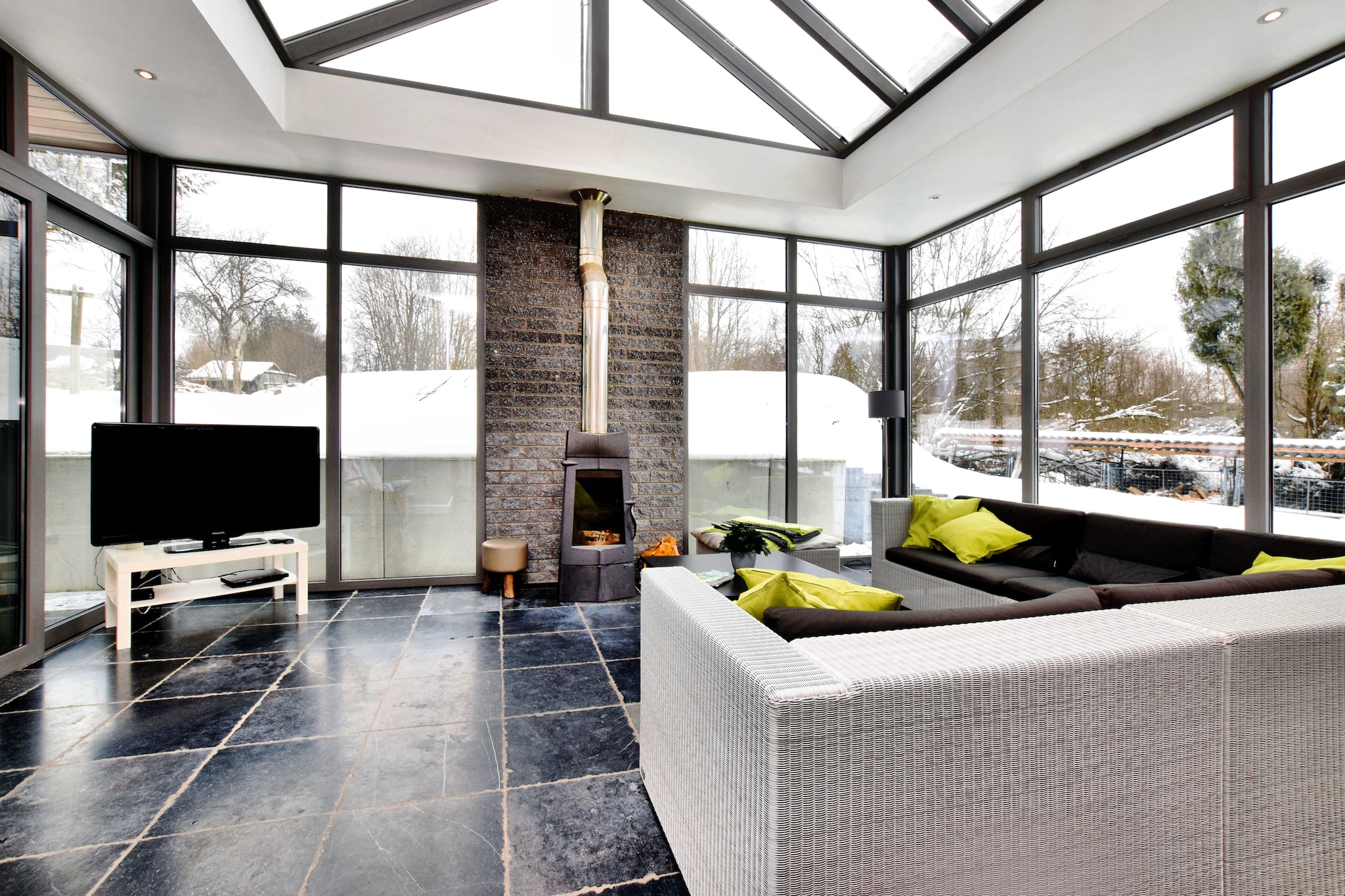 An optional utilities and service fee of EUR 260,00 will be charged before your arrival. Details are given below.<br> This 6-bedroom holiday home in Courtil (Gouvy) comes with a bubble bath to stretch out your muscles after a tiring day. The holiday home is ideal for 14 guests, be it a large extended family or 2-3 smaller families staying together._x000D_
_x000D_
Gouvy is a Walloon municipality of Belgium known for Ch<U+FFFD>teau des Moudreux and Mus<U+FFFD>e du Coticule. The surrounding area is perfect for walking and cycling._x000D_
_x000D_
There's a coffee machine in the kitchen to prepare a steaming cup of coffee at any time. You can get cozy around the wood stove in the living room on colder evenings and enjoy playing billiards with your loved ones. A game computer and air hockey set up is here for children. Cozy barbecue evenings can be enjoyed on the terrace with your loved ones. The furnished garden is perfect for having meals and soaking in the sun. A children's bed, 2 high chairs, and parking spaces are available. <br><b> Optional Utilities & Service Package </b><br><b> An optional utilities and service package of EUR 260,00 </b> can be selected prior to your arrival. You will receive a separate communication with the payment link should you wish to include it.<br>This package ensures a seamless stay and conveniently covers services such as final cleaning, utility consumption, service support, and protection against minor damages or incidental costs during your stay.<br>Guests who prefer may manage these services independently, provided the property is returned in good order at check-out.