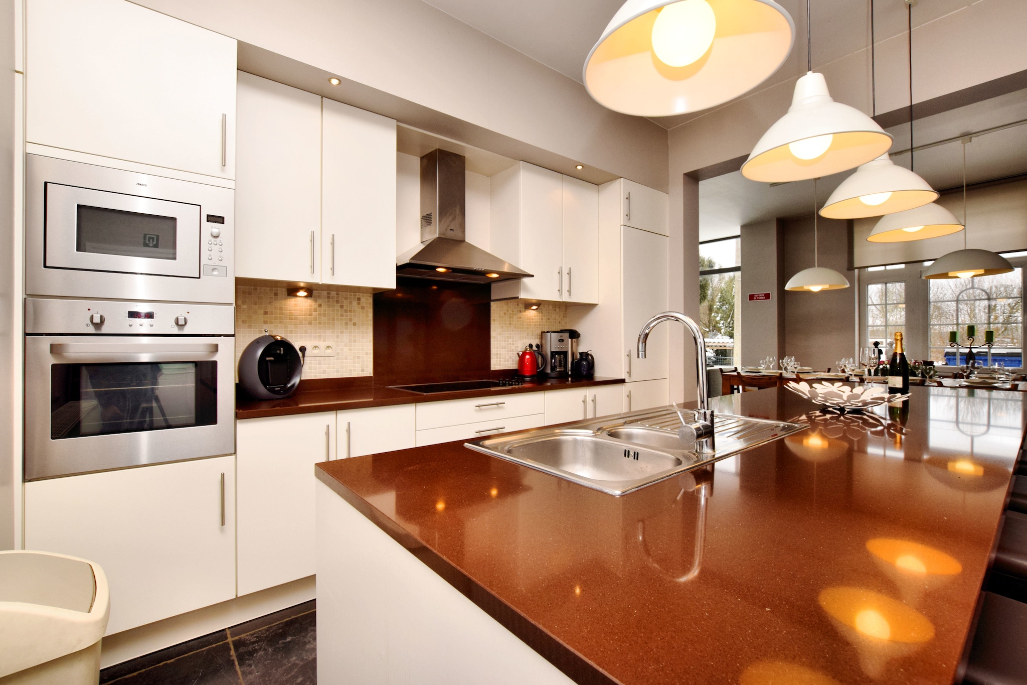 Ground floor: (Kitchen(cooker(ceramic), coffee machine, oven, microwave, dishwasher, fridge-freezer), Living/diningroom(TV(cable), stove(wood), DVD player), Children\'s bedroom, toilet(reachable from the outside), recreation room(billiards), conservatory/veranda)\n\nOn the 1st floor: (bedroom(double bed), bedroom(bunk bed), Bedroom with bathroom(double bed, bath tub, washbasin), bathroom(shower, washbasin), toilet)\n\nOn the 2nd floor: (bedroom(double bed), bedroom(2x single bed, 3-person bunk bed), Bedroom with bathroom(double bed, shower, washbasin), bathroom(tumble dryer, shower, washbasin, washing machine), toilet)\n\nBasement: (recreation room(TV, DVD player, game computer, air hockey))\n\nBubble bath, terrace(roofed), garden, garden furniture, BBQ, parking, children\'s bed, high chair, high chair