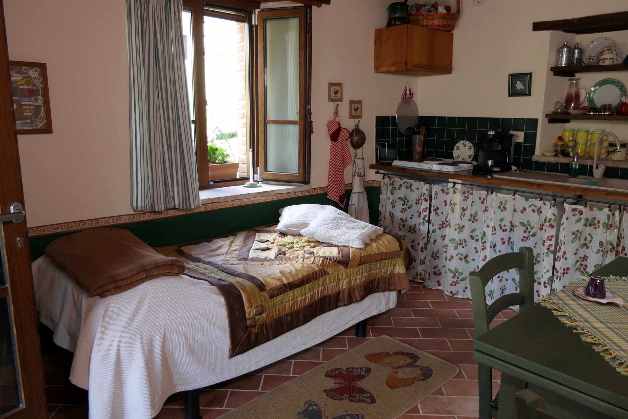 Rustiek appartement in de Apennijnen met een tuin en veranda