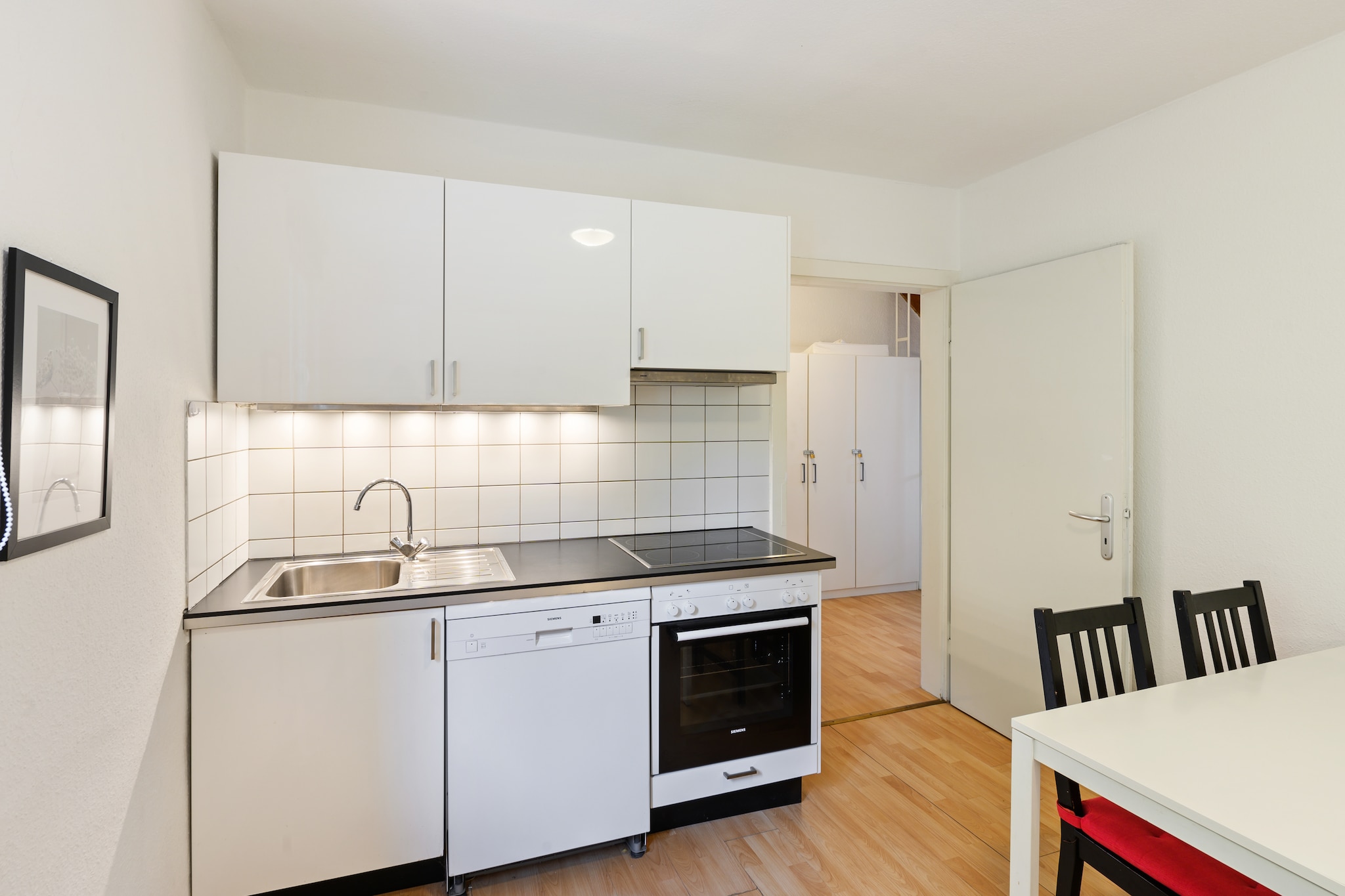 Ground floor: (Entrance, bathroom(washbasin, toilet), Landing, storage(tumble dryer, washing machine, ironing board, iron))\n\nOn the 1st floor: (Kitchen(dining table(4 persons), electric kettle, toaster, cooker(4 ring stoves, ceramic), coffee machine(filter), oven, microwave, dishwasher, fridge-freezer), Living/bed room(double sofa bed, TV, dining table(10 persons), stereo unit), bedroom(double bed(180 x 200 cm)), bathroom(shower, washbasin, toilet))\n\nOn the 2nd floor: (bedroom(double bed(180 x 200 cm)), bedroom(double bed(180 x 200 cm)), bedroom(double bed(180 x 200 cm)), bedroom(double bed(180 x 200 cm)), bathroom(shower, washbasin, toilet))\n\ncot, cot, balcony, heating(central), terrace, garden furniture, parking, high chair