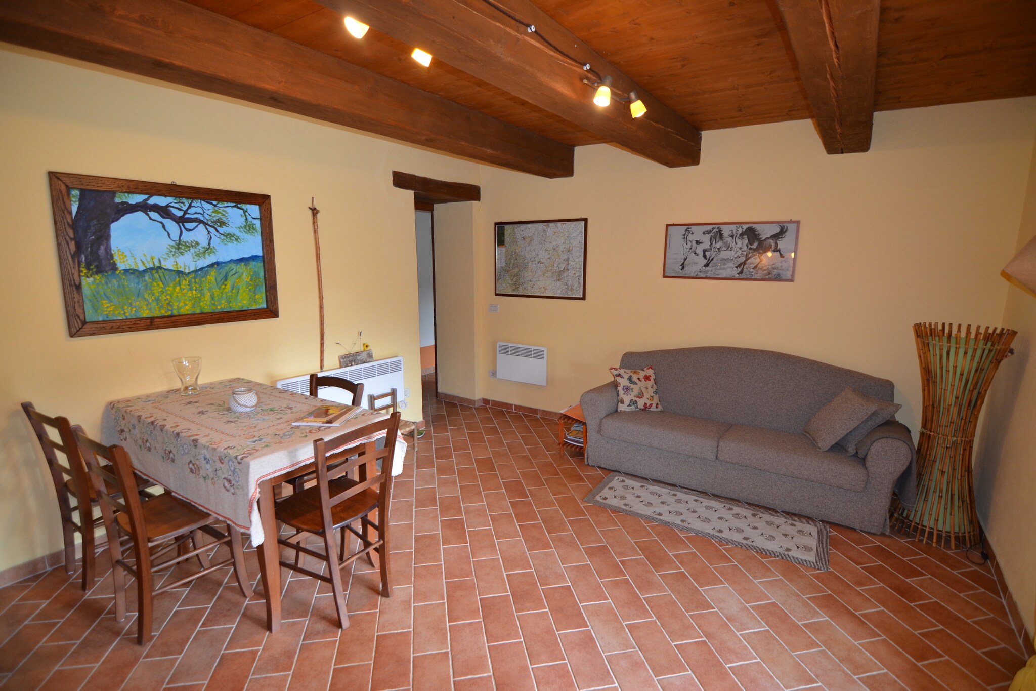 Ground floor: (open kitchen, Large kitchen(double sofa bed(150 x 190 cm), dining table, hob, electric kettle, coffee machine), bedroom(double bed), bathroom(shower, washbasin, toilet, bidet, washing machine), storage(tumble dryer))\n\npatio, garden(shared with other guests), garden furniture, sun loungers, BBQ, parking, bicycles available, children\'s bed