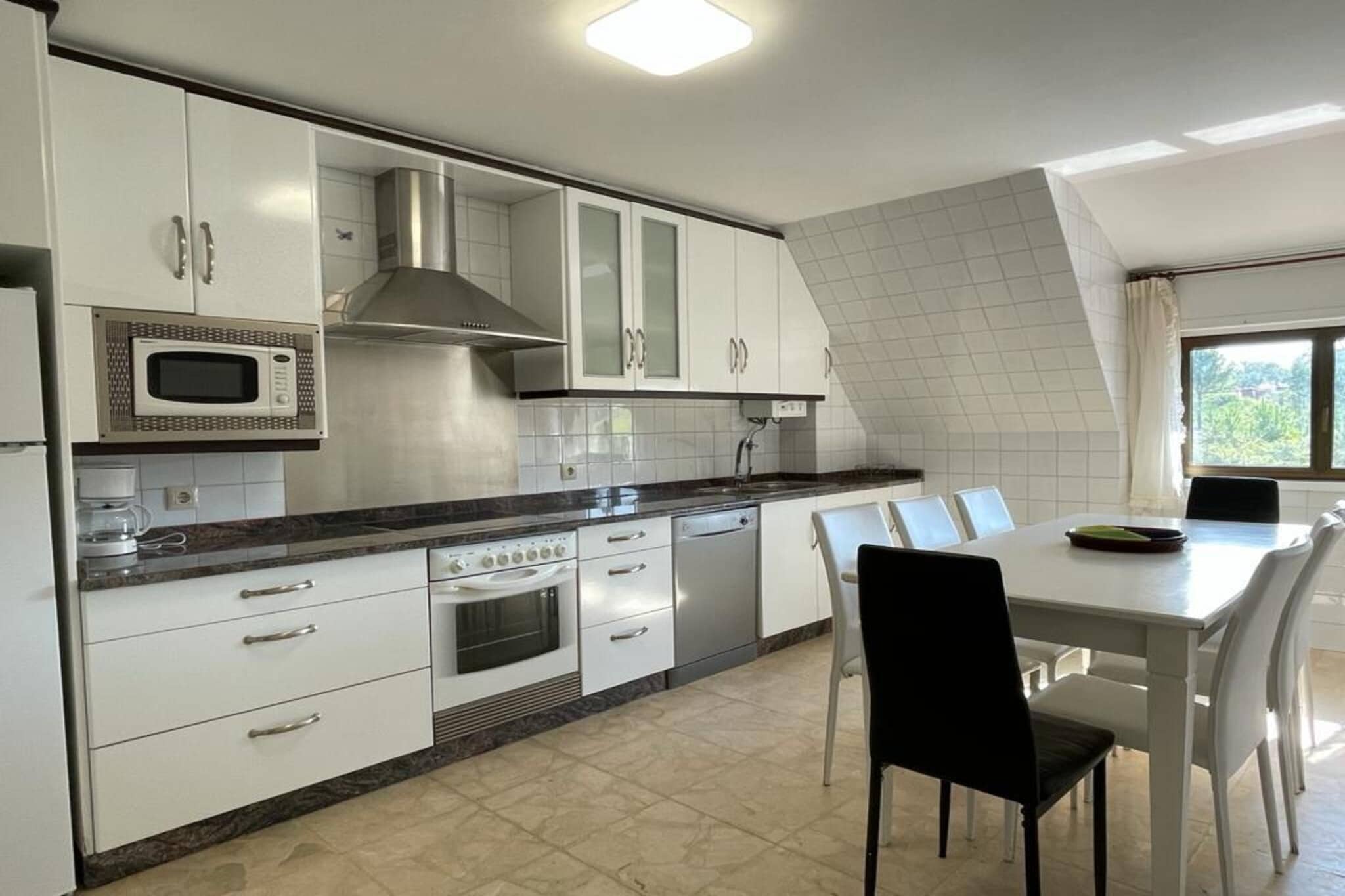 On the 1st floor: (Kitchen(cooker(ceramic), combination microwave, dishwasher, freezer, washing machine), Living/diningroom(TV), bedroom(2x single bed), bedroom(2x single bed), bedroom(2x single bed), bedroom(double bed), bathroom(bathtub with shower, washbasin, toilet), bathroom(bathtub with shower, washbasin, toilet), balcony or terrace)