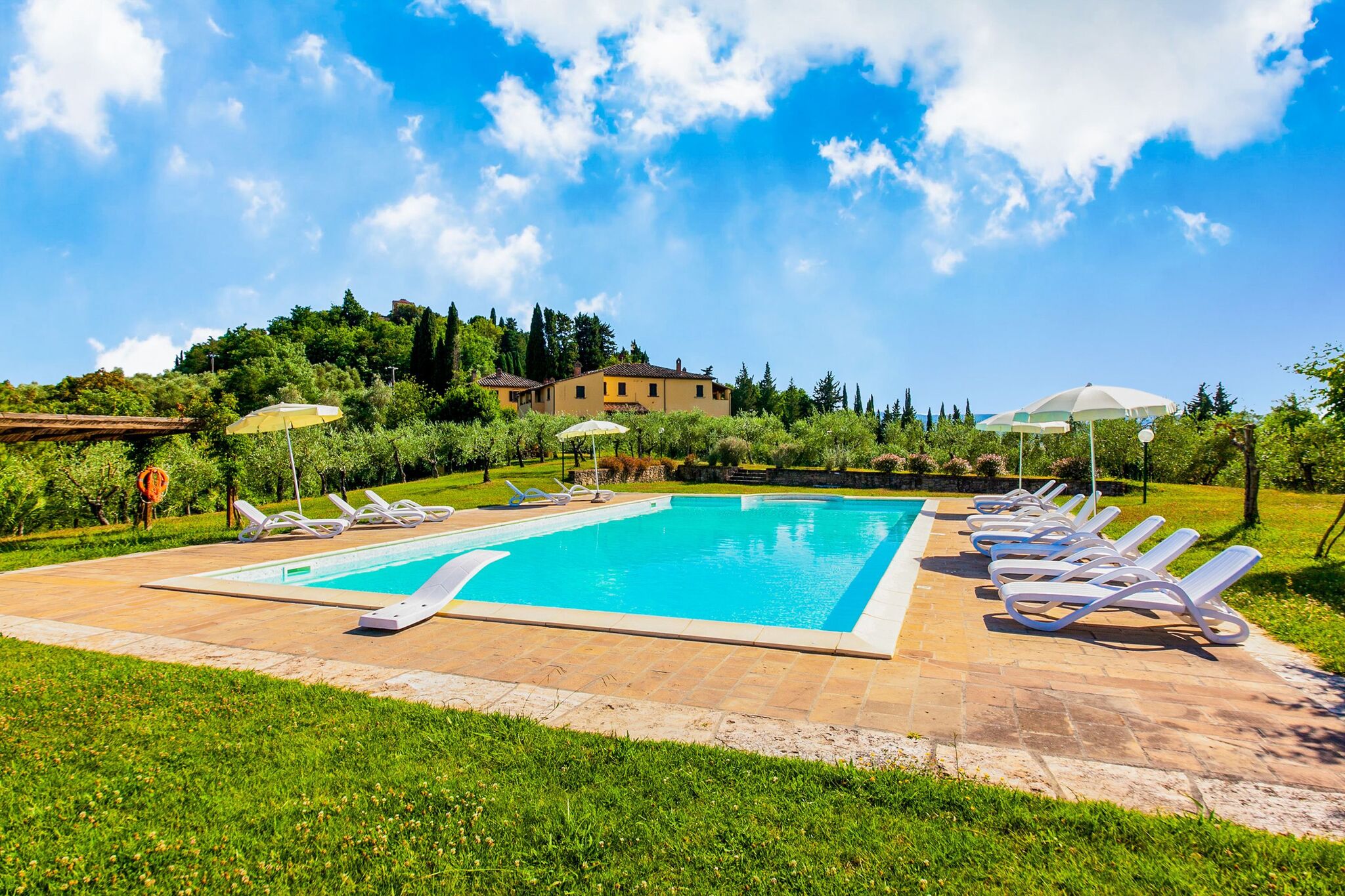 small village of beautiful apartments in the green Tuscan hills and olive groves