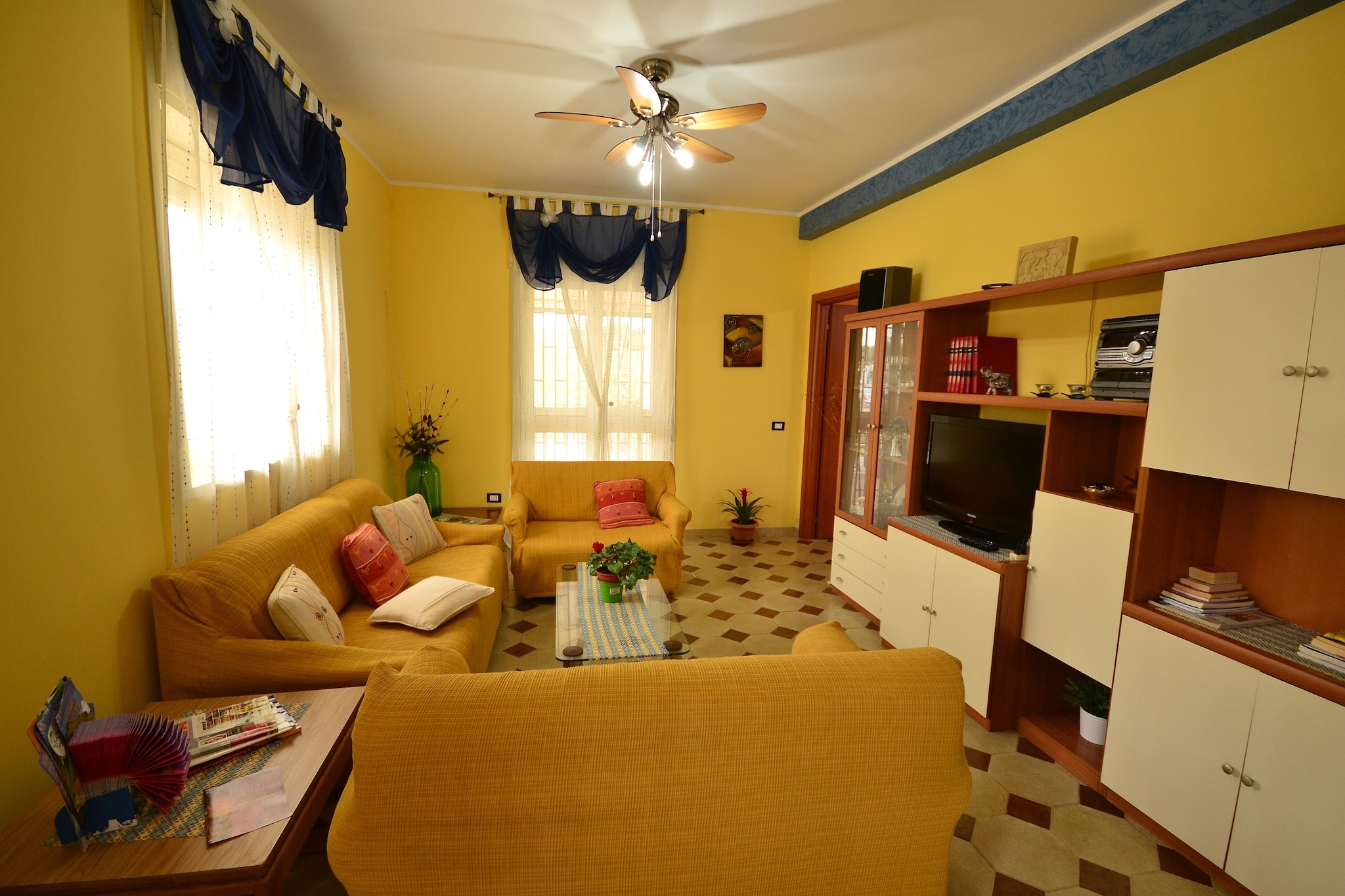 Ground floor: (open kitchen(oven, combination microwave, fridge-freezer), Living/diningroom(double sofa bed, TV, DVD player, radio, CD player), bedroom(double bed or 2 single beds), bedroom(double king size bed), bathroom(bath tub, washbasin, toilet, bidet), veranda, washing machine, BBQ, parking, children\'s bed(on request))