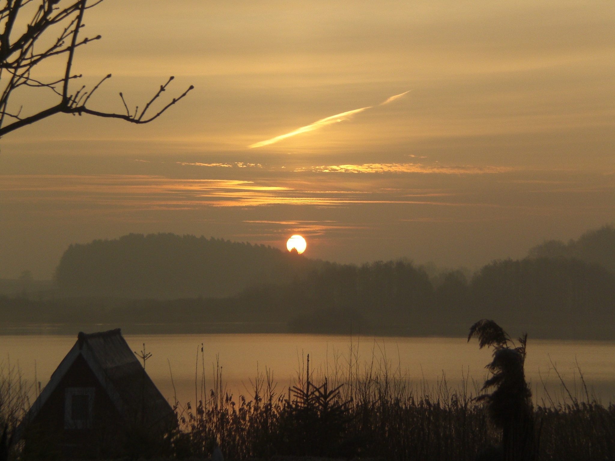   Das Haus Am See mit Kamin und eigenem Boot