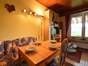 Comfortabele en gezellige kleine bungalow met tuin, terras en mooi uitzicht.