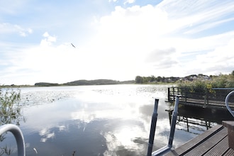 Haus Am See mit Kamin und Bootssteg