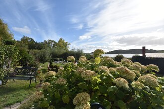 Haus Am See mit Kamin und Bootssteg
