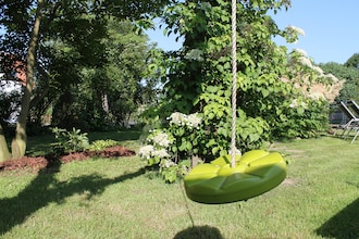 Romantische Ferienwohnung an der Ostsee mit Garten