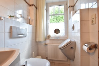 Romantische Ferienwohnung an der Ostsee mit Garten