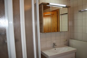In der Schoß