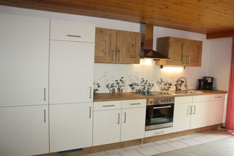 In der Schoß