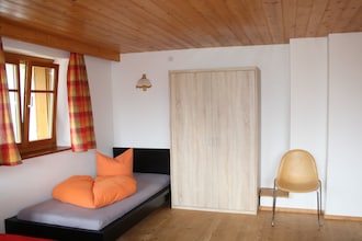 In der Schoß