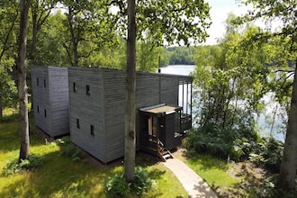 The Large Lake House by YourNature