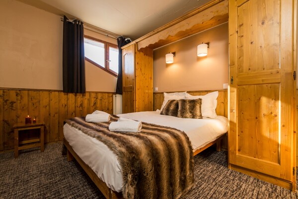 Authentiek chalet-appartement in Val Thorens met houtkachel en balkon - thumbnail 1