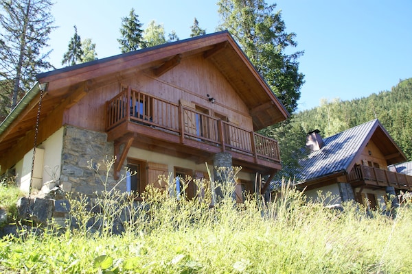 Authentiek chalet voor 8 aan de piste met panoramisch uitzicht op het meer - thumbnail 5