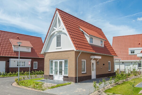 Jaren '30 villa met verwarmd terras op 1 km van het strand in Dishoek - thumbnail 1