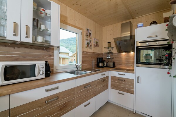 Luxe houten chalet aan de piste met privé jacuzzi en sauna - thumbnail 4