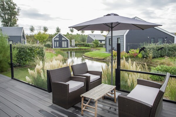 Charming Oosterschelde: luxe chalet aan golfbaan en natuur - thumbnail 4