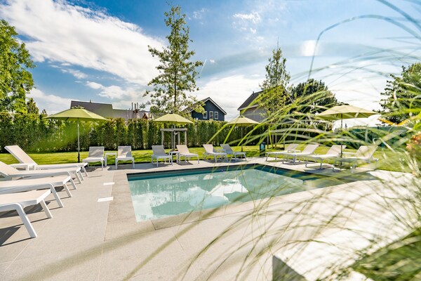 Luxueuze vrijstaande bungalow Biebosch op resort in Zuid-Limburg - thumbnail 6