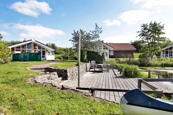 Luxe vakantiehuis aan het water in Ottendorf met sauna en whirlpool - thumbnail 1