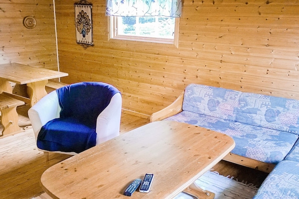 Eenvoudig vakantiehuis aan meer Skarsvatnet met boot en uitzicht op Åmøya - thumbnail 4