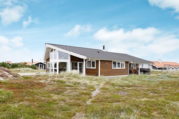 Rustiek vakantiehuis met zeezicht, sauna en whirlpool op 500m van strand - thumbnail 1