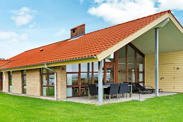 Luxe vakantiehuis direct aan het water met whirlpool en panoramisch zicht op de Flensburger Förde - thumbnail 1