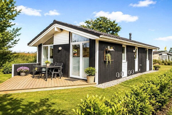 Aan zee: Licht vakantiehuis in Scandinavische stijl in Grömitz · 52 m² - thumbnail 1