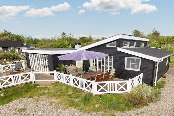 Vrijstaand vakantiehuis aan de Limfjord met panoramisch uitzicht en strand op 100 meter - thumbnail 1