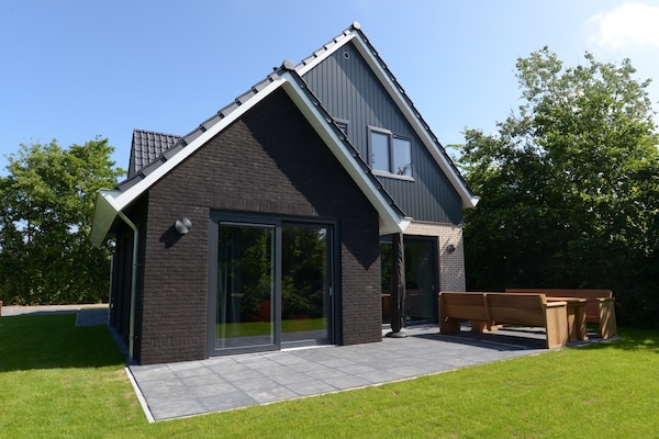 Luxe villa in het bos van De Dennen, 1,5 km van zee - thumbnail 1