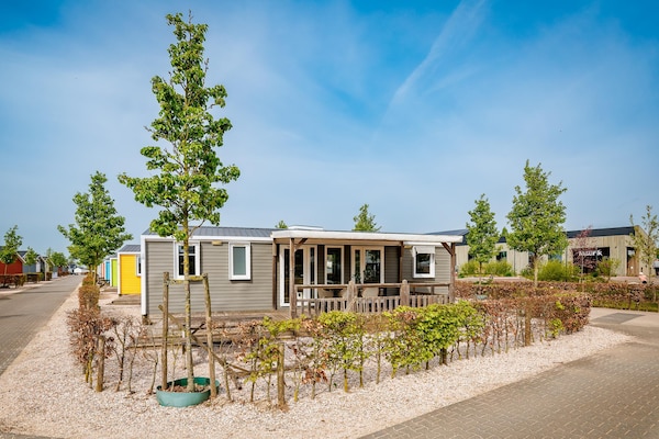 Strandchalet de Luxe aan de recreatieplas in Maurik - thumbnail 1