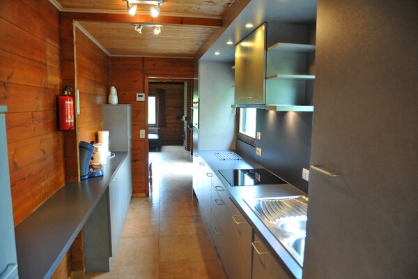 9-persoons bungalow met sauna en haard in Hour - thumbnail 4