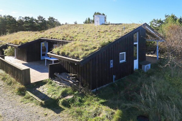 Duinvilla met privé zwembad en sauna op 100 meter van het Noordzeestrand - thumbnail 1
