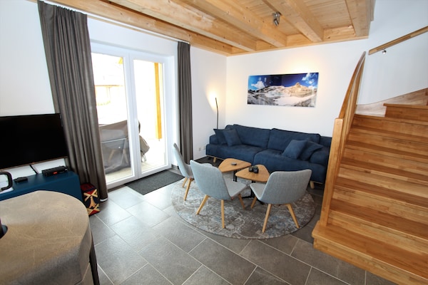 Modern chalet voor 6 personen aan de bosrand, vlakbij skilift en centrum - thumbnail 2