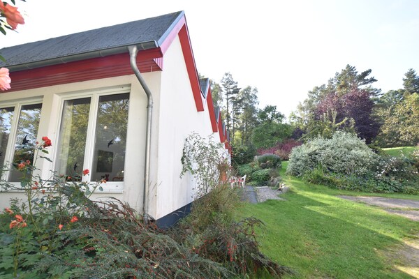 Artistiek vakantiehuis met Oostzeezicht en tuin in Kühlungsborn - thumbnail 6