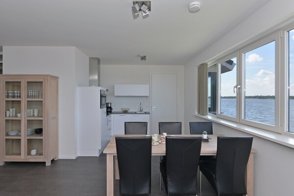 Exclusief penthouse met panoramisch uitzicht en privé aanlegsteiger aan het Veerse Meer - thumbnail 2